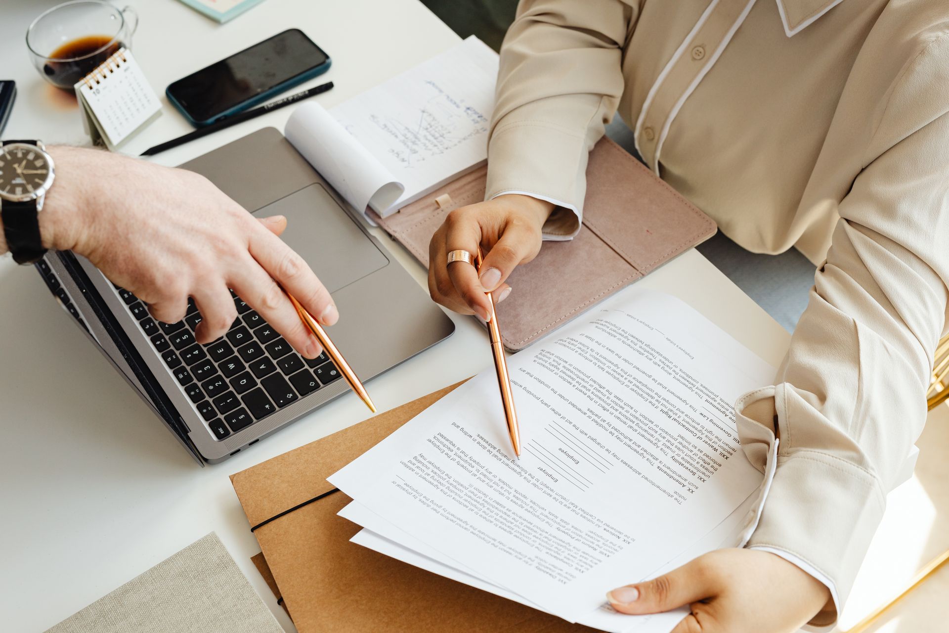 Attorney reviewing legal documents during consultation